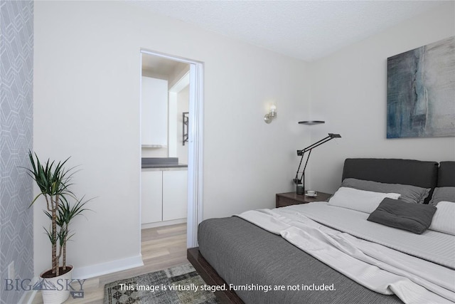 21 Sitting Bull Rd Unit 1226, Big Sky, MT 59716 - bedroom featuring wood finished floors