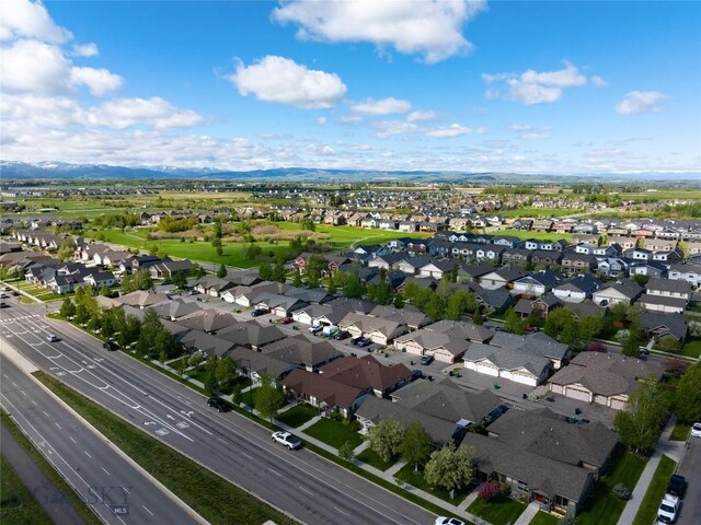 1079 N Cottonwood Rd, Bozeman, MT 59718 - aerial view of property's location featuring nearby suburban area and a mountainous background