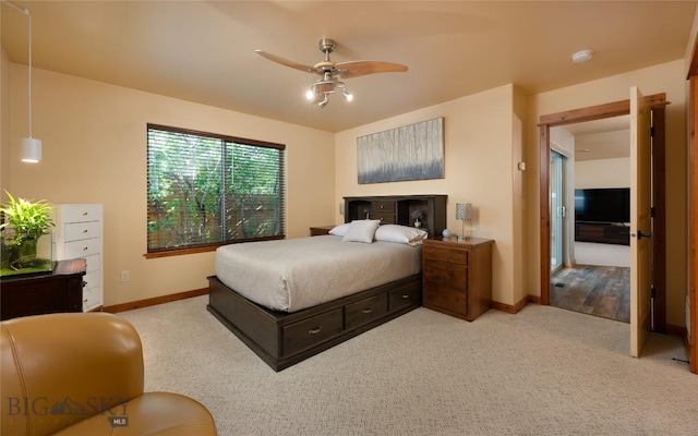 1079 N Cottonwood Rd, Bozeman, MT 59718 - carpeted bedroom with baseboards and ceiling fan