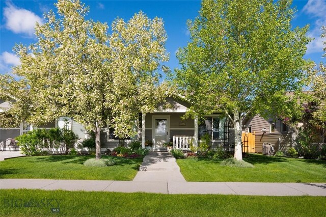 1079 N Cottonwood Rd, Bozeman, MT 59718 - view of property hidden behind natural elements featuring a front yard