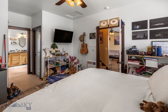 2472 Milkhouse Ave, Bozeman, MT 59718 - bedroom featuring connected bathroom, carpet, and a ceiling fan