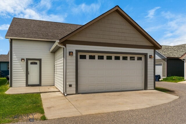 2472 Milkhouse Ave, Bozeman, MT 59718 - view of front facade with a shingled roof and a garage