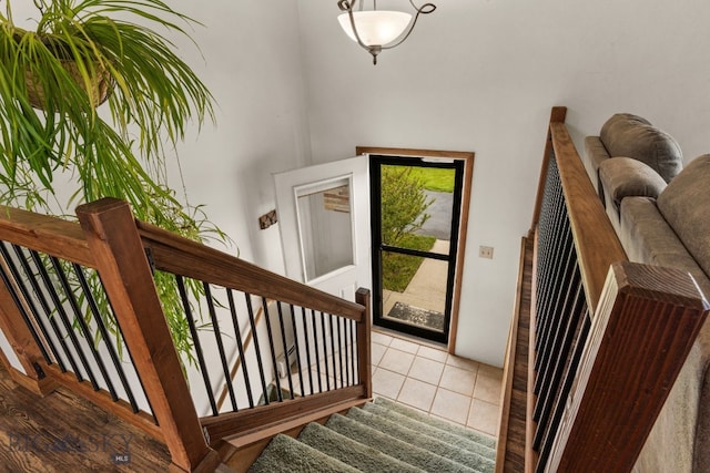 22 Rocky Mountain Dr, Whitehall, MT 59759 - tiled foyer featuring stairs