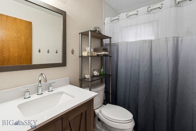 22 Rocky Mountain Dr, Whitehall, MT 59759 - bathroom with toilet, vanity, and a shower with shower curtain