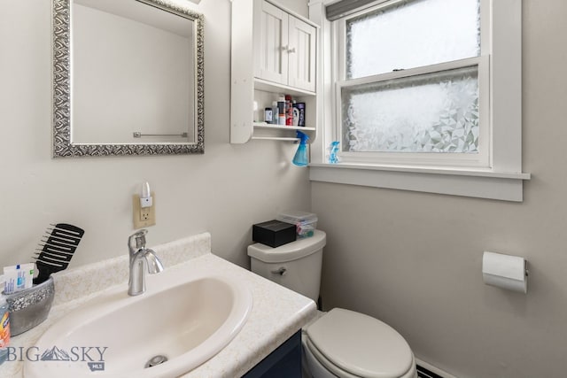 22 Rocky Mountain Dr, Whitehall, MT 59759 - half bathroom featuring toilet and vanity