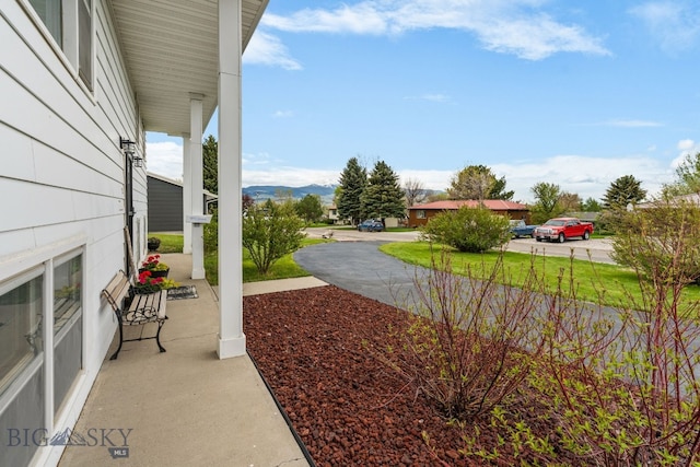22 Rocky Mountain Dr, Whitehall, MT 59759 - view of yard featuring a mountain view and a porch
