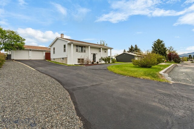 22 Rocky Mountain Dr, Whitehall, MT 59759 - split foyer home with a chimney