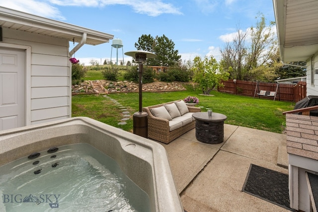 22 Rocky Mountain Dr, Whitehall, MT 59759 - view of patio / terrace featuring a hot tub and outdoor lounge area