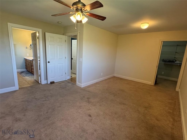 30 Grand View Ln, Big Timber, MT 59011 - unfurnished bedroom featuring carpet, a spacious closet, and baseboards