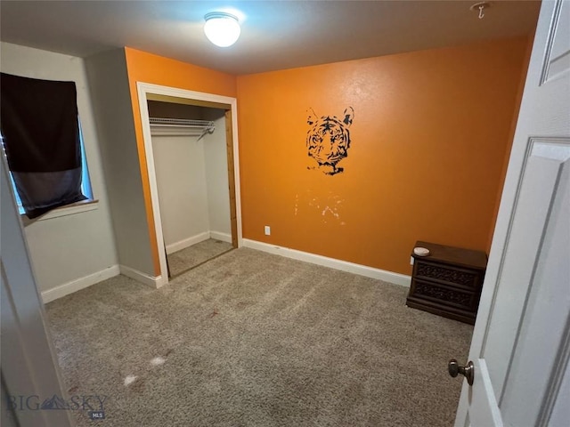 30 Grand View Ln, Big Timber, MT 59011 - unfurnished bedroom featuring carpet floors, a closet, and baseboards