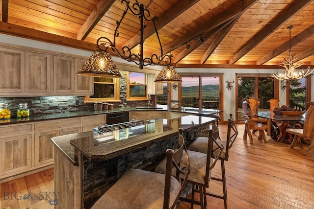14585 Eagle Eye Way, Gallatin Gateway, MT 59730 - kitchen featuring wood ceiling, a chandelier, decorative backsplash, light wood-type flooring, and gas cooktop
