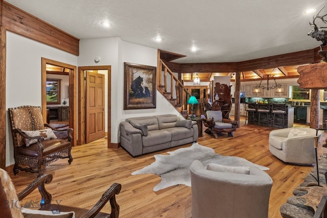 14585 Eagle Eye Way, Gallatin Gateway, MT 59730 - living room featuring stairway, wood finished floors, and recessed lighting
