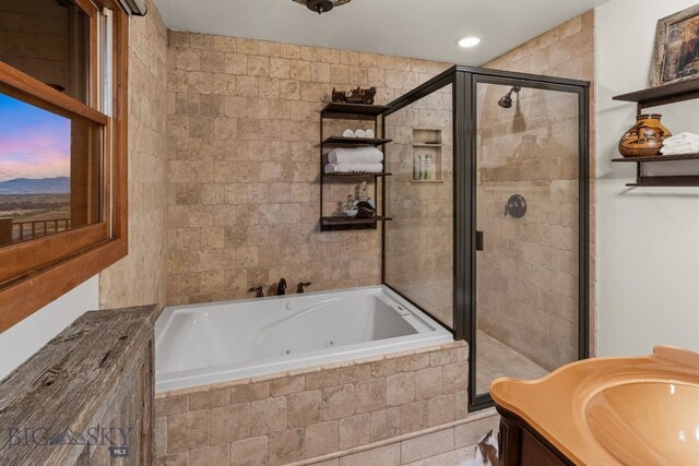 14585 Eagle Eye Way, Gallatin Gateway, MT 59730 - full bathroom with a stall shower, a whirlpool tub, and vanity