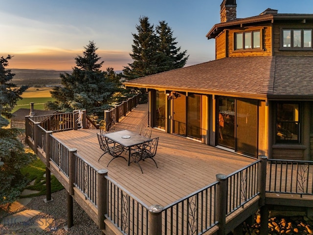 14585 Eagle Eye Way, Gallatin Gateway, MT 59730 - wooden deck featuring outdoor dining area