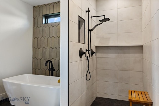 646 Arrow Trl, Bozeman, MT 59718 - bathroom with a freestanding bath and tiled shower
