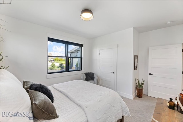 646 Arrow Trl, Bozeman, MT 59718 - bedroom with light carpet and baseboards