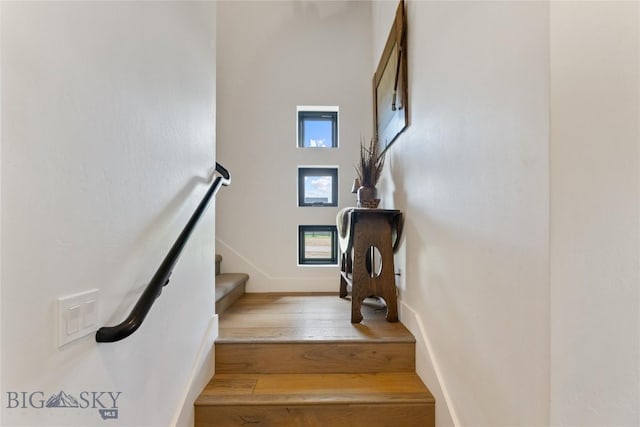 646 Arrow Trl, Bozeman, MT 59718 - staircase featuring wood finished floors and baseboards
