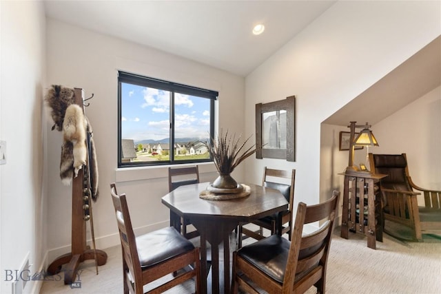646 Arrow Trl, Bozeman, MT 59718 - dining room with light carpet, vaulted ceiling, baseboards, and recessed lighting