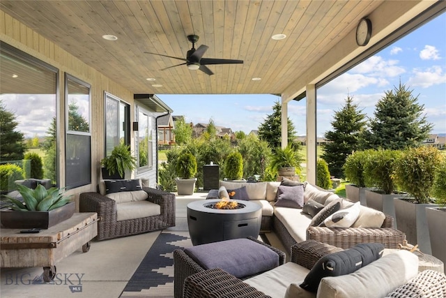 646 Arrow Trl, Bozeman, MT 59718 - view of patio / terrace with an outdoor living space with a fire pit and a ceiling fan