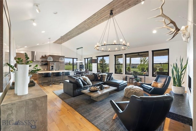 646 Arrow Trl, Bozeman, MT 59718 - living area with a chandelier, light wood finished floors, and recessed lighting