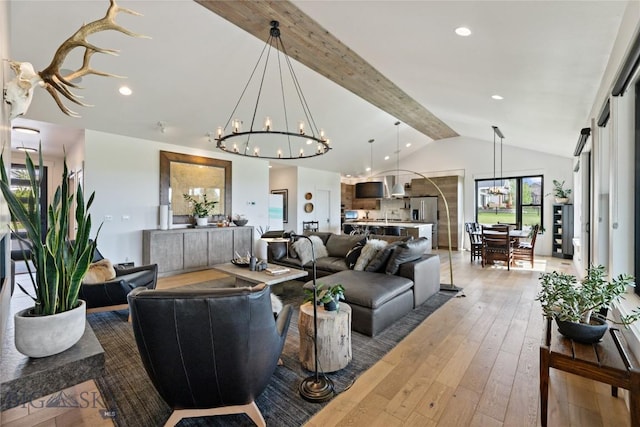 646 Arrow Trl, Bozeman, MT 59718 - living room featuring a chandelier, light wood-style floors, and recessed lighting
