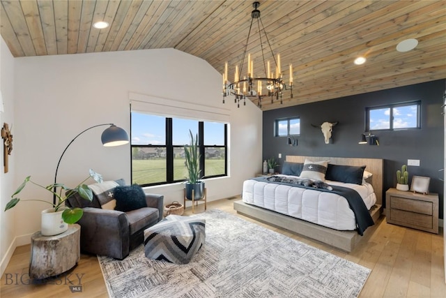646 Arrow Trl, Bozeman, MT 59718 - bedroom with vaulted ceiling, wood ceiling, wood finished floors, recessed lighting, and a chandelier