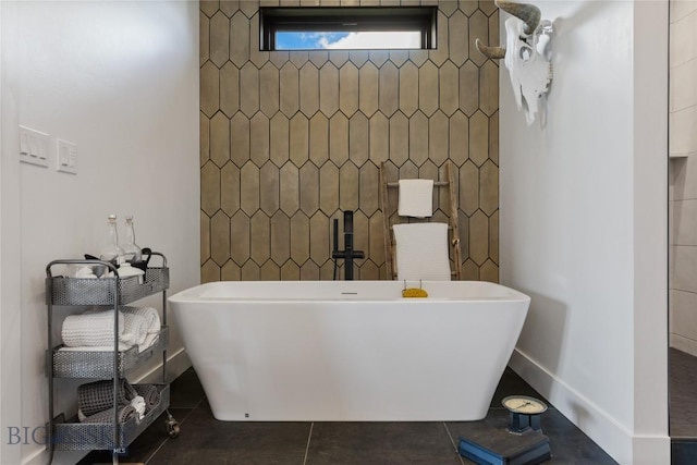646 Arrow Trl, Bozeman, MT 59718 - bathroom with tile patterned flooring and a freestanding tub