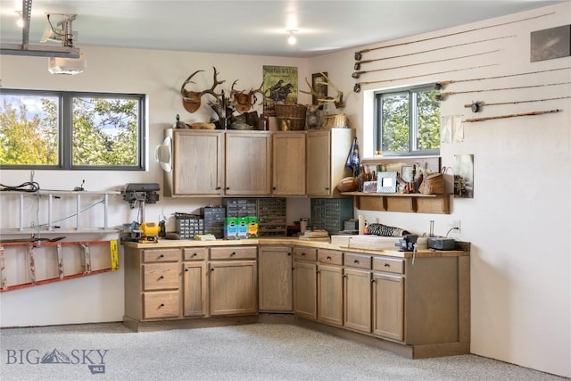 646 Arrow Trl, Bozeman, MT 59718 - kitchen with light countertops, tasteful backsplash, and light carpet