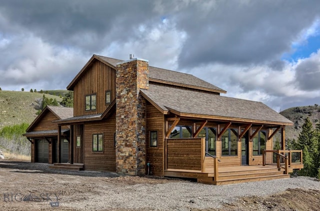16 Sagittarius Skwy, Emigrant, MT 59027 - view of front facade featuring a shingled roof and a chimney