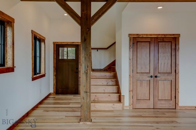 16 Sagittarius Skwy, Emigrant, MT 59027 - foyer with light wood-style floors, stairs, recessed lighting, baseboards, and lofted ceiling