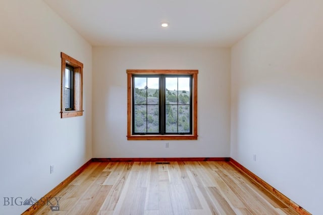 16 Sagittarius Skwy, Emigrant, MT 59027 - unfurnished room featuring light wood finished floors, baseboards, and recessed lighting