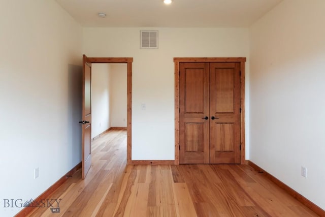 16 Sagittarius Skwy, Emigrant, MT 59027 - unfurnished bedroom with light wood finished floors, baseboards, and recessed lighting