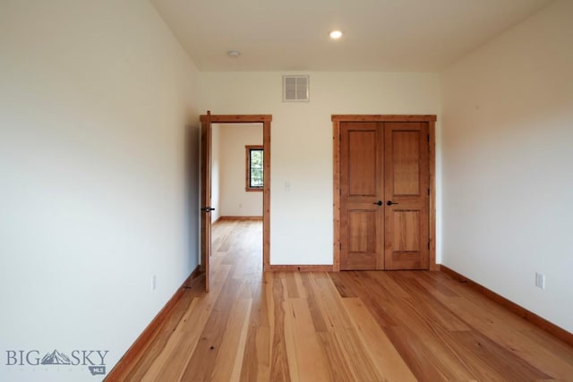 16 Sagittarius Skwy, Emigrant, MT 59027 - unfurnished bedroom featuring light wood-style flooring, baseboards, and recessed lighting