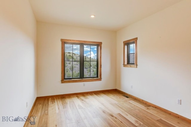16 Sagittarius Skwy, Emigrant, MT 59027 - unfurnished room featuring light wood finished floors, baseboards, and recessed lighting