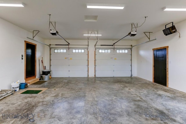 16 Sagittarius Skwy, Emigrant, MT 59027 - garage featuring a garage door opener