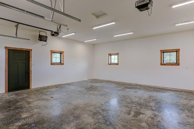 16 Sagittarius Skwy, Emigrant, MT 59027 - garage featuring a garage door opener