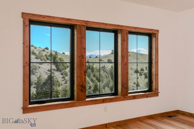 16 Sagittarius Skwy, Emigrant, MT 59027 - unfurnished room with baseboards and wood finished floors