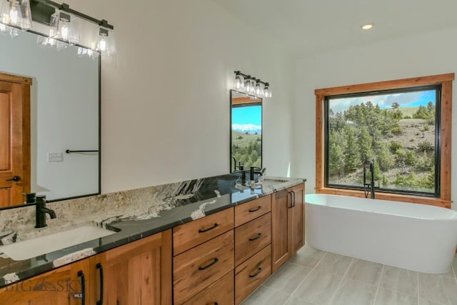 16 Sagittarius Skwy, Emigrant, MT 59027 - full bath featuring double vanity, a soaking tub, and recessed lighting