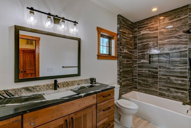 16 Sagittarius Skwy, Emigrant, MT 59027 - full bath featuring double vanity, toilet,  shower combination, recessed lighting, and wood finished floors