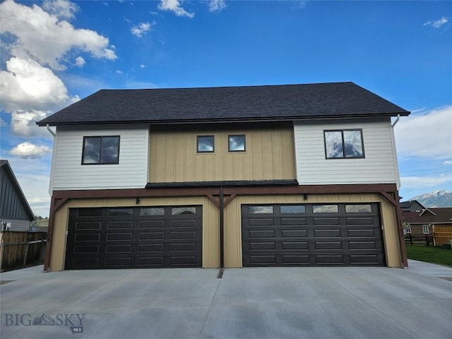 1102 Ridgeview Trl, Livingston, MT 59047 - view of front facade featuring a garage, a shingled roof, and concrete driveway