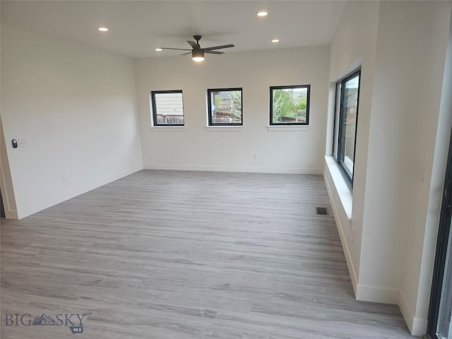 1102 Ridgeview Trl, Livingston, MT 59047 - empty room featuring healthy amount of natural light, recessed lighting, a ceiling fan, light wood finished floors, and baseboards