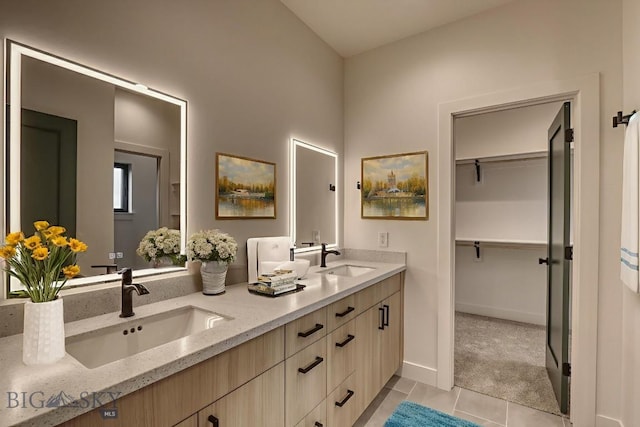 1102 Ridgeview Trl, Livingston, MT 59047 - full bath featuring double vanity, tile patterned flooring, and a walk in closet