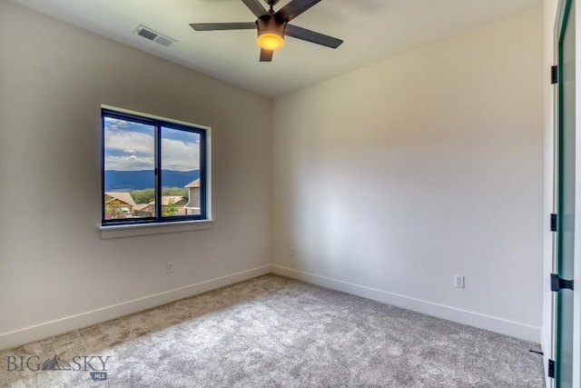 1102 Ridgeview Trl, Livingston, MT 59047 - carpeted spare room with a ceiling fan and baseboards