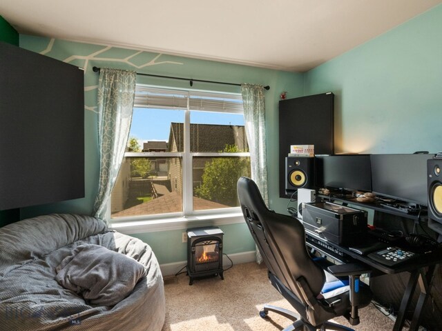 1009 Wyoming St, Belgrade, MT 59714 - carpeted office with a wood stove