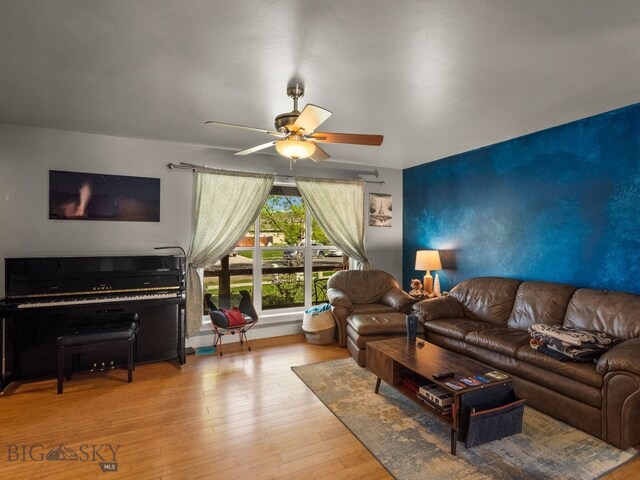 1009 Wyoming St, Belgrade, MT 59714 - living area with a ceiling fan and hardwood / wood-style flooring
