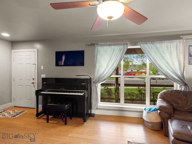 1009 Wyoming St, Belgrade, MT 59714 - living area featuring a ceiling fan, hardwood / wood-style floors, and recessed lighting