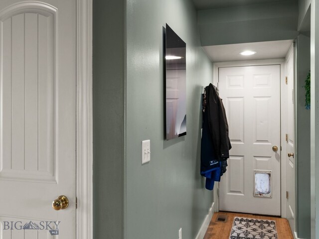 1009 Wyoming St, Belgrade, MT 59714 - doorway with wood finished floors