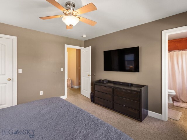 1009 Wyoming St, Belgrade, MT 59714 - bedroom with light colored carpet, ensuite bathroom, and a ceiling fan