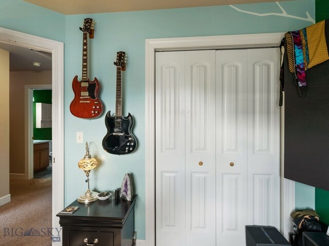 1009 Wyoming St, Belgrade, MT 59714 - doorway to outside with baseboards and carpet