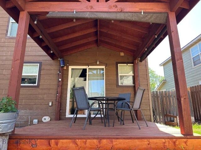 1009 Wyoming St, Belgrade, MT 59714 - wooden deck with outdoor dining area